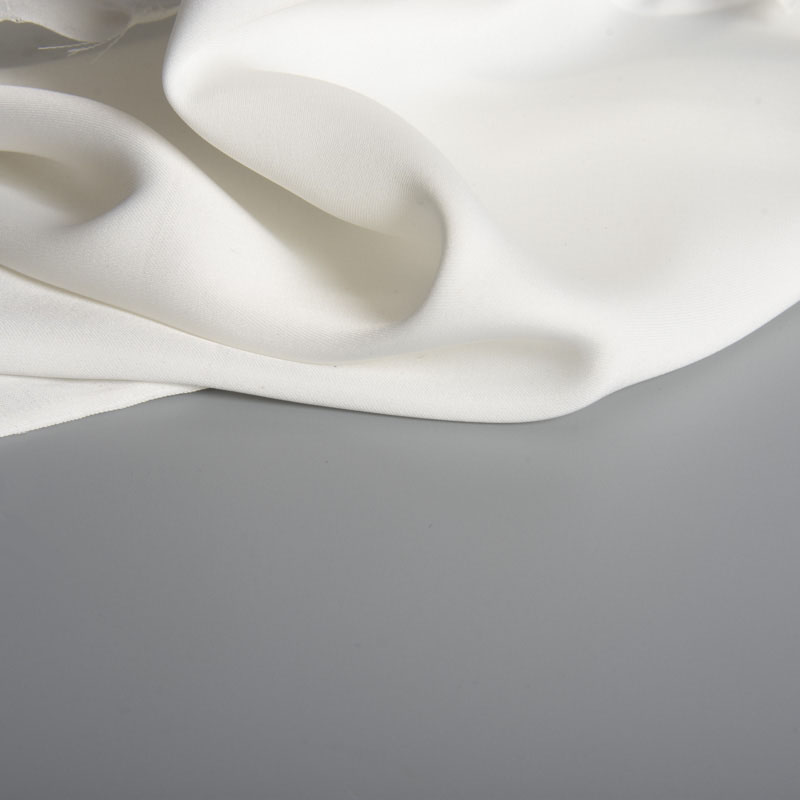 Begoodtex-Tejidos-Ignífugos-00471 Tejido Begoodtex ignífugo con aspecto de seda, superficie de poliéster y elastano blanco